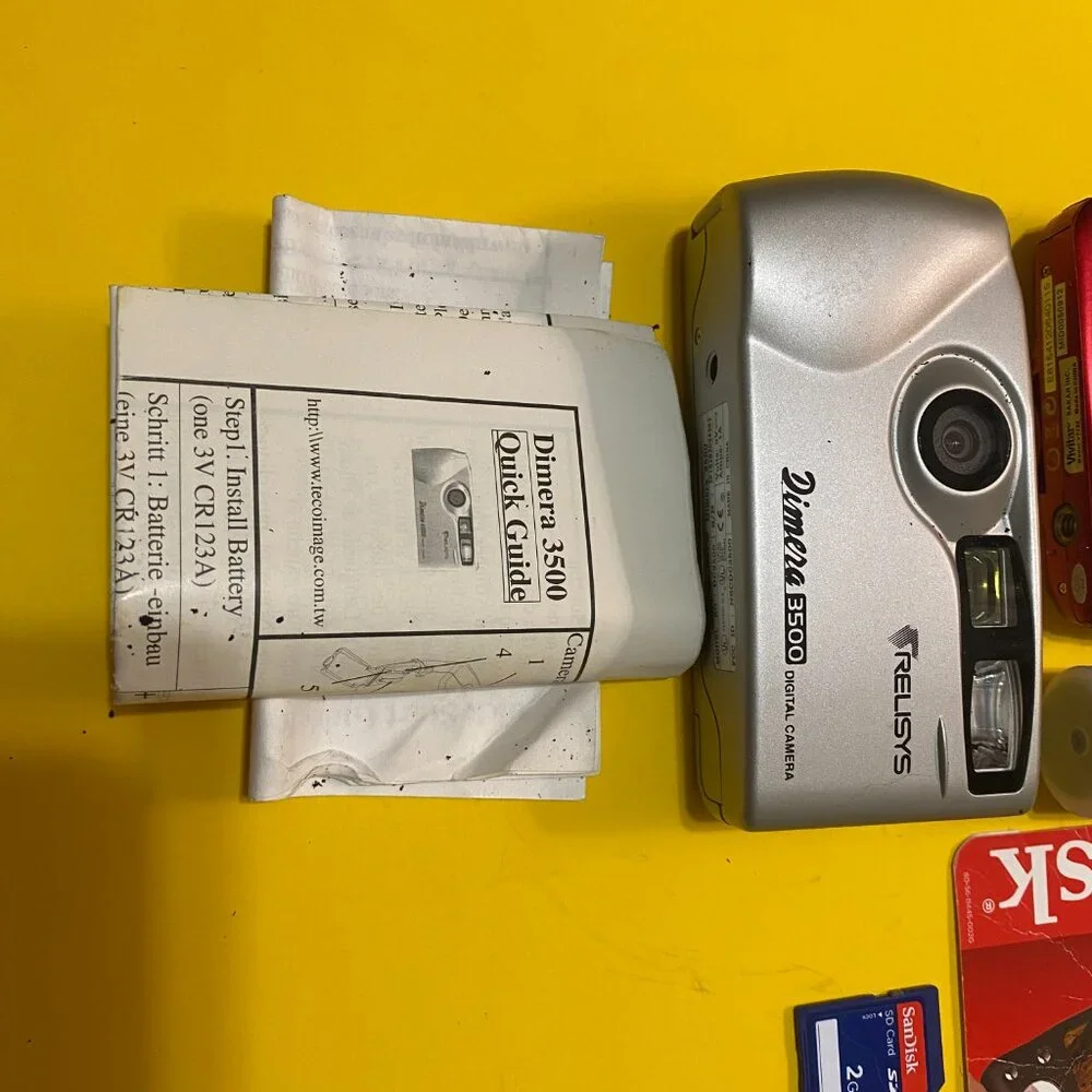CAMERAS, VIVITAR AND DIMERA DIGITAL 3500 GENTLY USED